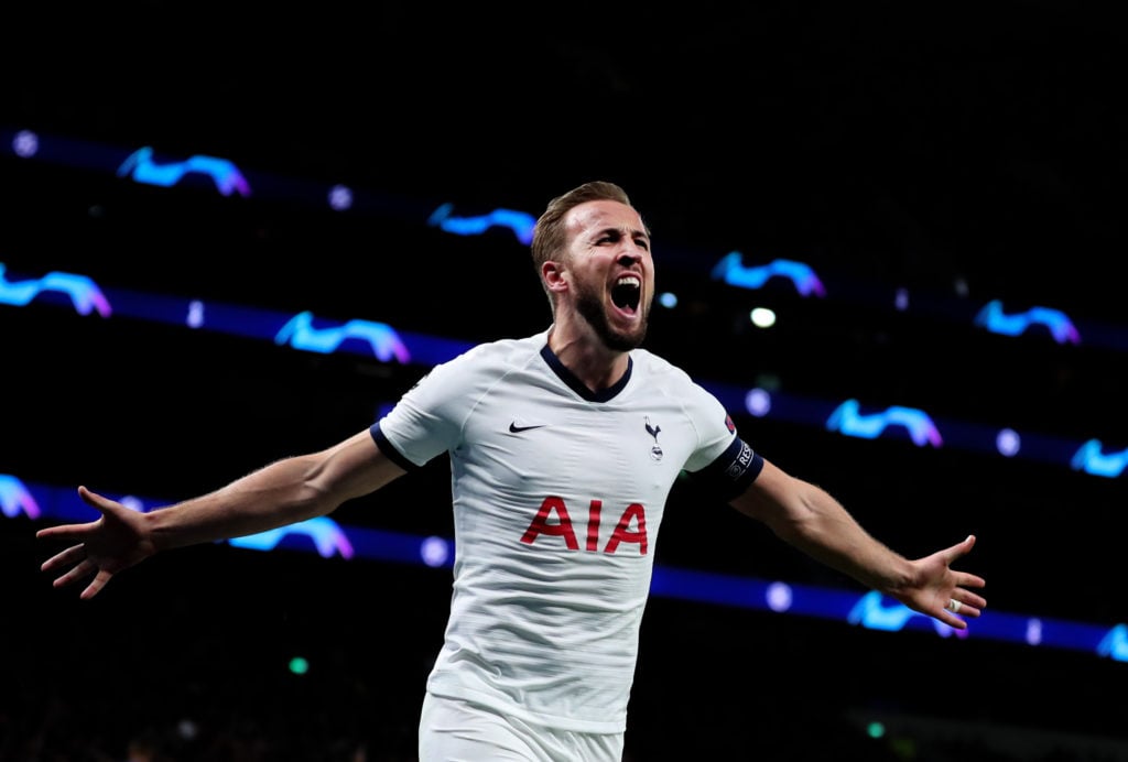 Harry Kane celebrates scoring for Tottenham against Olympiacos in the Champions League.