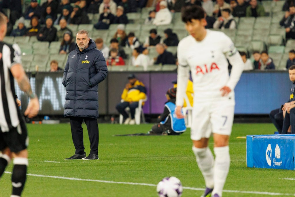 Tottenham Hotspur FC Head Coach Ange Postecoglou (C) looks