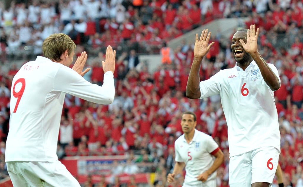 England's Ledley King (R) celebrates wit