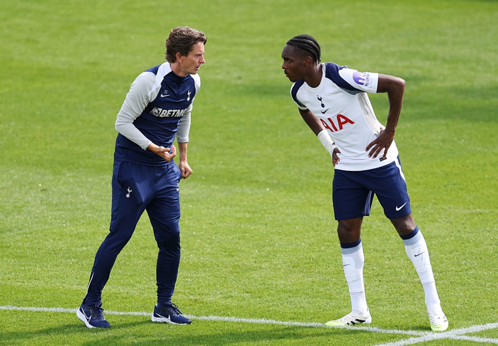 Tottenham manager Thomas Frank giving instructions to Mathys Tel