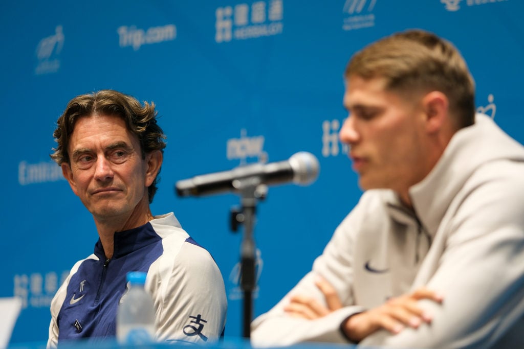 Tottenham Hotspur head coach Thomas Frank (L) and player Micky van de Ven attend a press conference