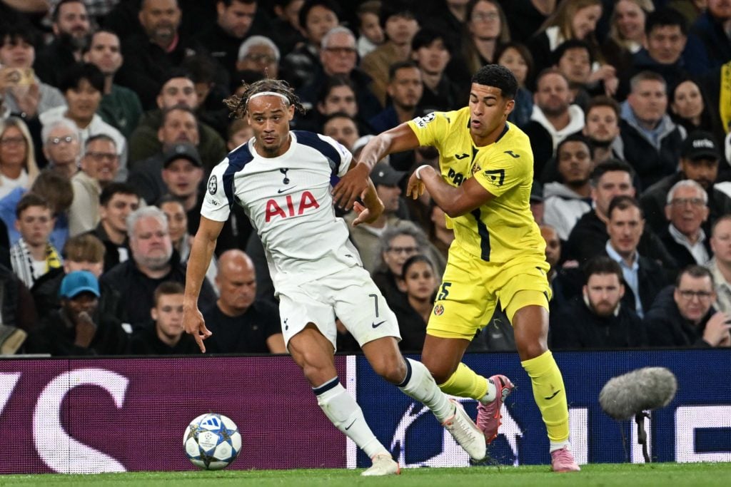 Tottenham star Xavi Simons competing for the ball against Villarreal in the Champions League.
