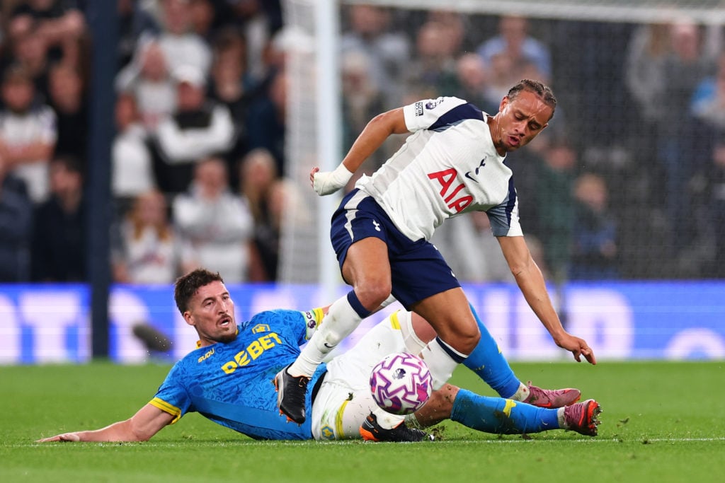 Matt Doherty challenges Xavi Simons during Tottenham Hotspur v Wolverhampton Wanderers - Premier League