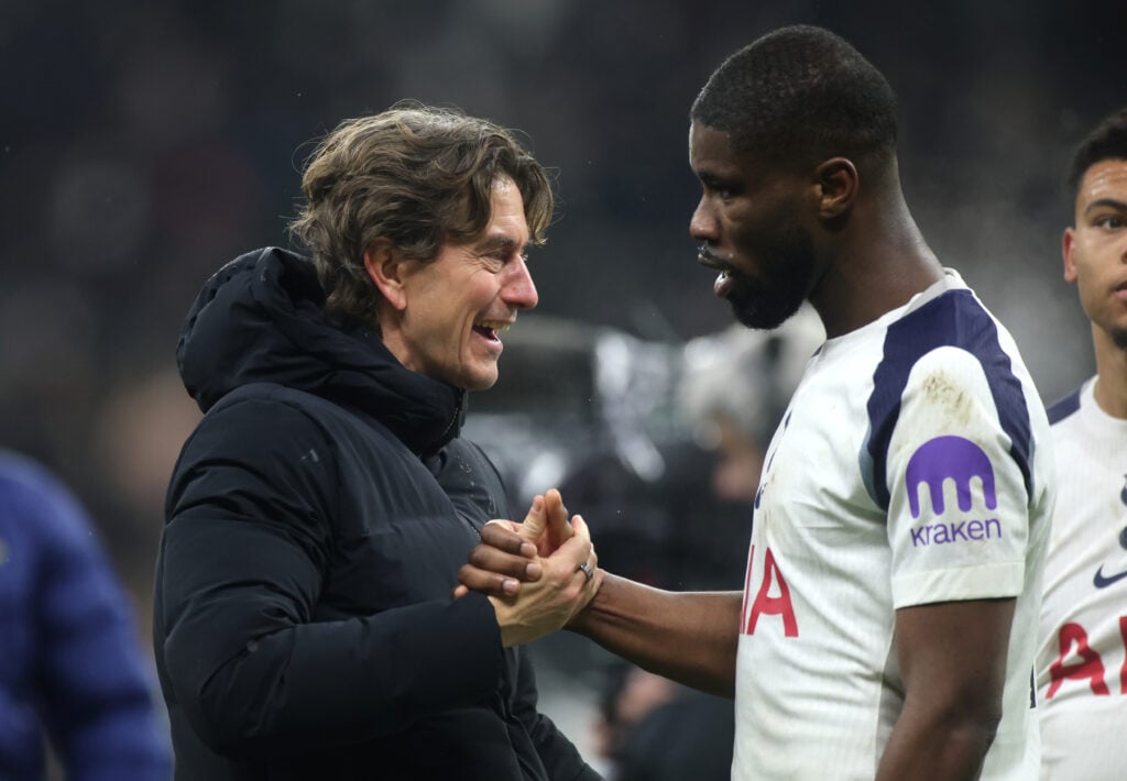 Thomas Frank congratulates his Tottenham players